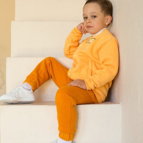 Спортивні штани дитячі утеплені унісекс тринитка Trendy Tot 03-01363 помаранчевий 104 см (4 роки) 03-01363-59051 фото &ndash; купити в Trendy Tot
